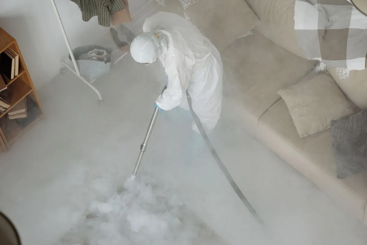 Biohazard cleanup technician in protective equipment, Dublin, GA